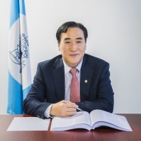 INTERPOL President Kim Jong Yang